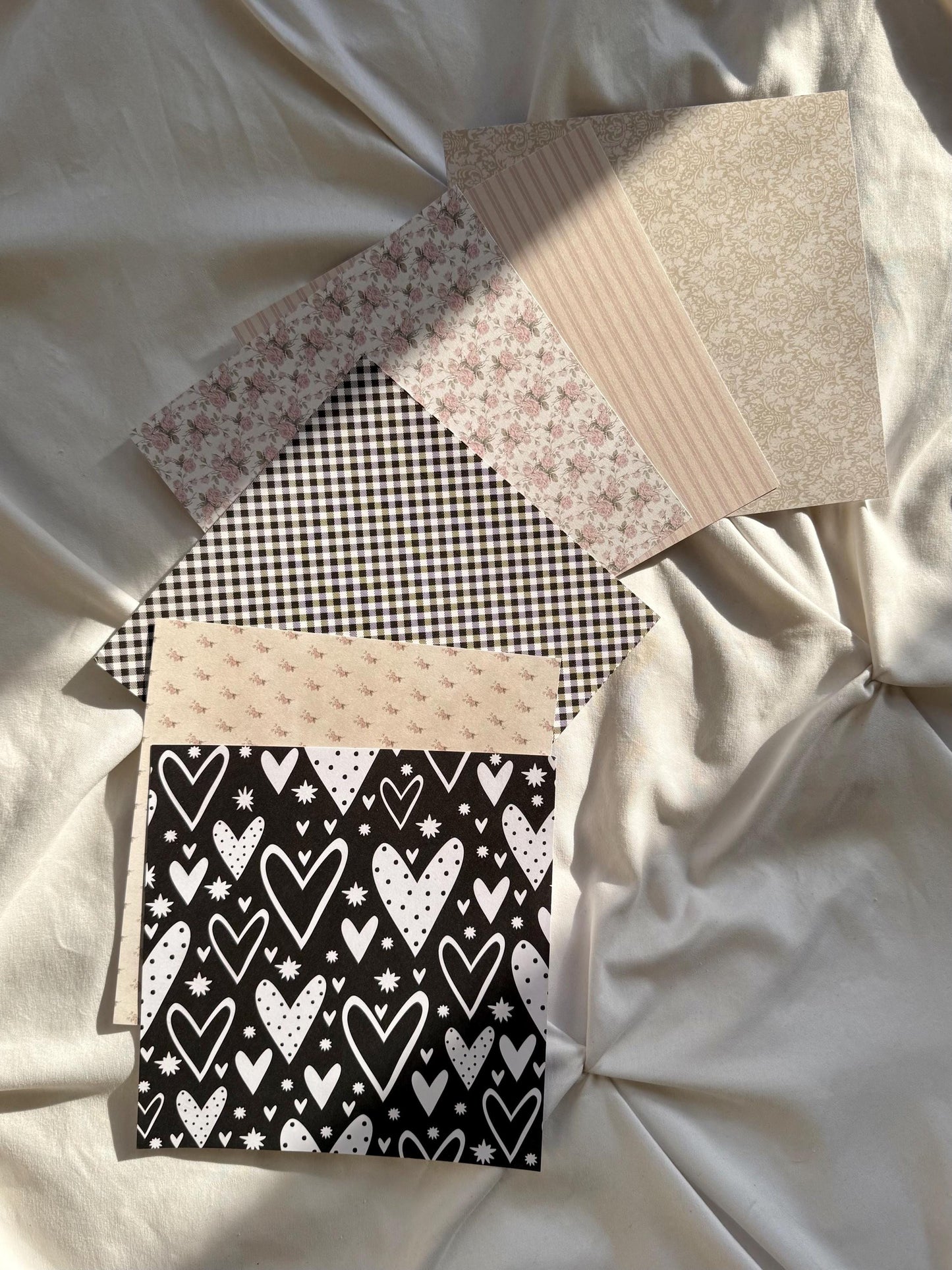 Six scrapbook papers.